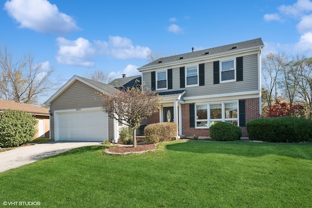 front of property featuring a garage and a front lawn