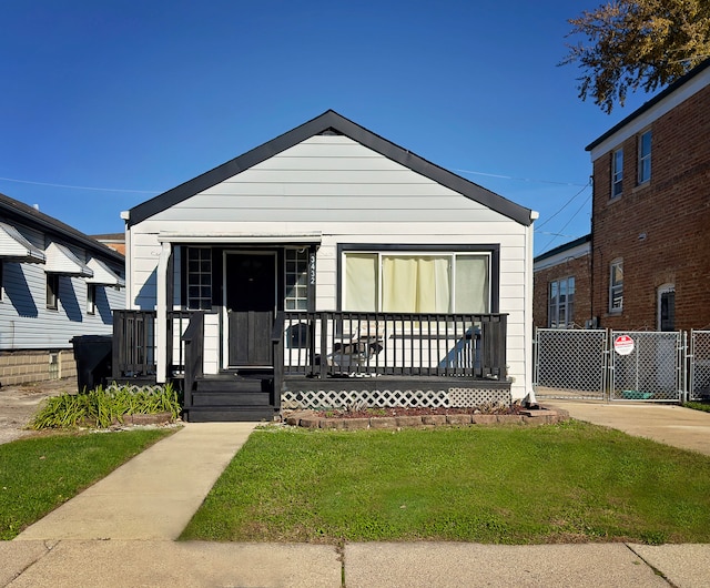 view of front of property with a front lawn