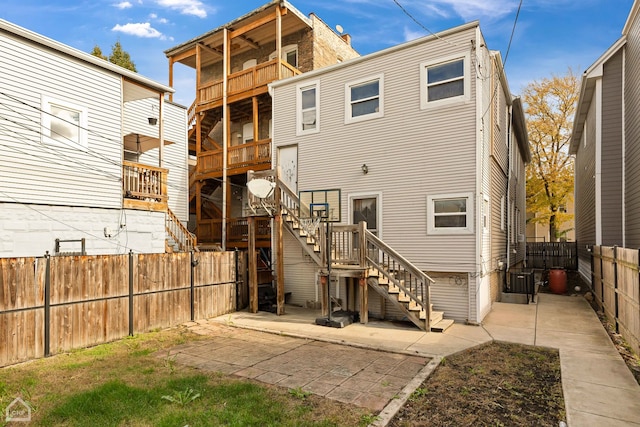 back of house with a patio area