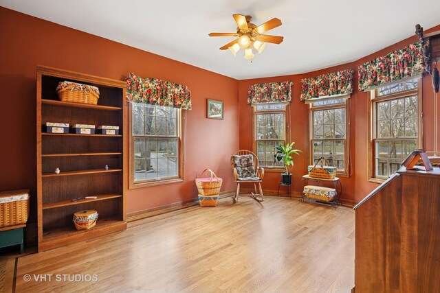 2418 Bennington Ln, Mchenry, IL 60050 - sitting room featuring wood finished floors, a ceiling fan, plenty of natural light, and baseboards