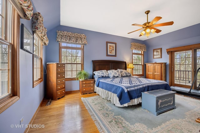 2418 Bennington Ln, Mchenry, IL 60050 - bedroom with wood finished floors, access to exterior, baseboards, and a ceiling fan