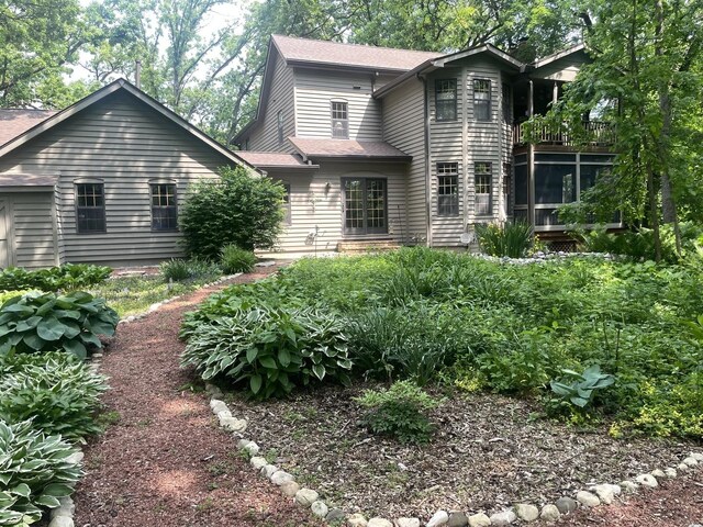 2418 Bennington Ln, Mchenry, IL 60050 - back of house featuring a balcony and roof with shingles