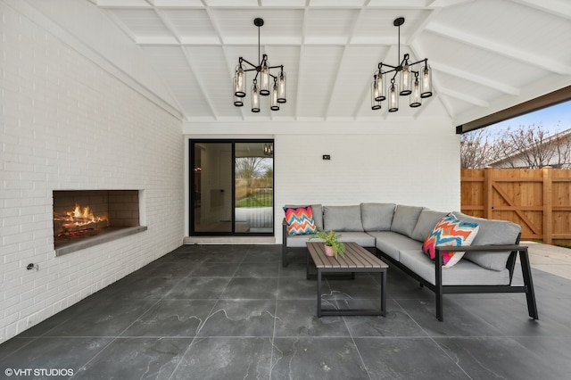 view of patio / terrace featuring an outdoor living space with a fireplace