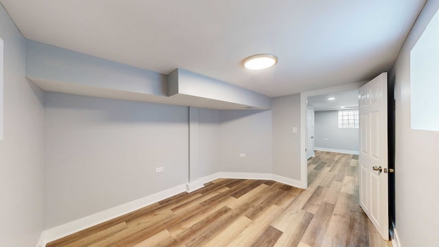 basement featuring light wood-type flooring