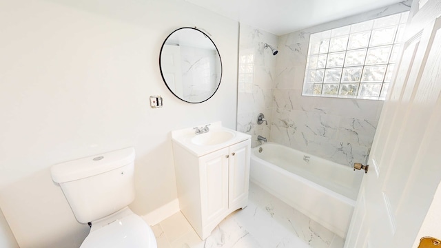 full bathroom featuring vanity, toilet, and tiled shower / bath