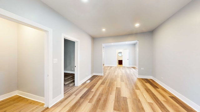 hallway with light wood-type flooring