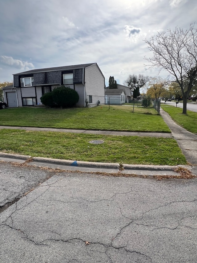 view of property exterior with a yard