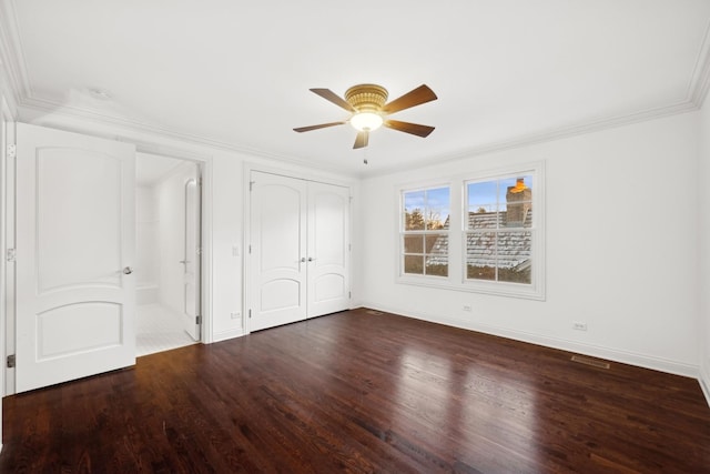 unfurnished bedroom featuring ceiling fan, hardwood / wood-style flooring, and crown molding