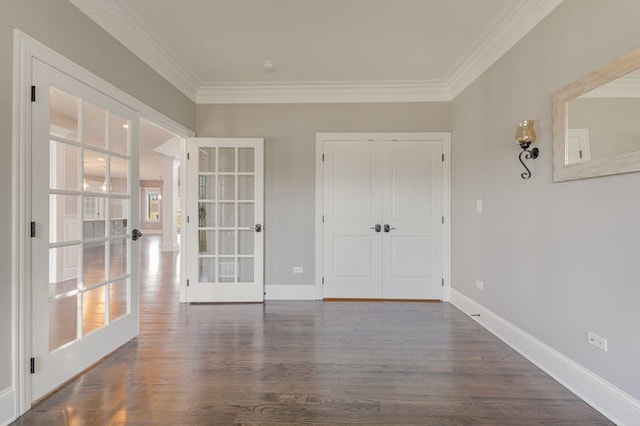 interior space featuring ornamental molding, french doors, and dark hardwood / wood-style floors