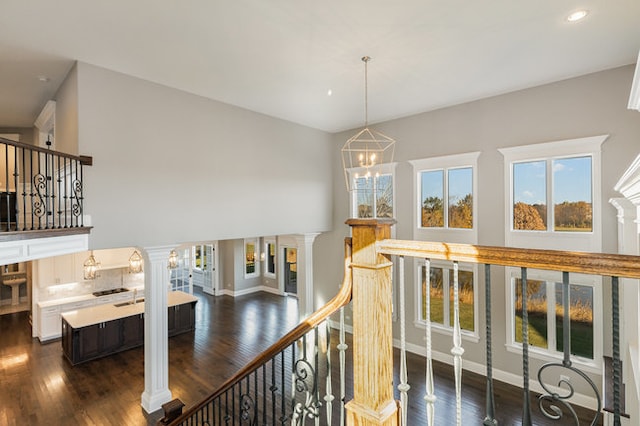 interior space with hardwood / wood-style floors and a notable chandelier