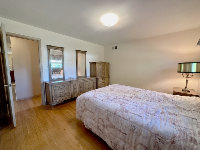 bedroom featuring light hardwood / wood-style floors