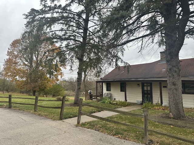 27996 W Roberts Rd, Lake Barrington, IL 60010 - view of front facade featuring a chimney and a shingled roof