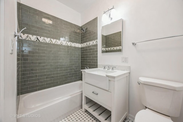 bathroom with bathtub / shower combination, vanity, and toilet