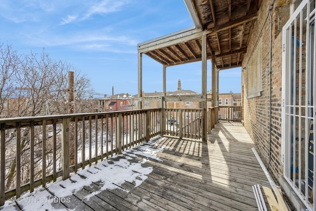 view of snow covered deck