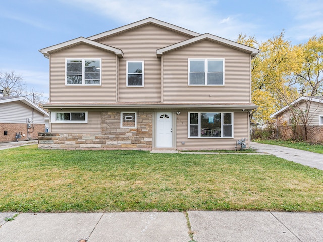 view of front of house with a front lawn