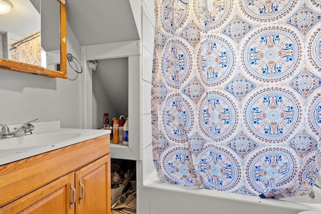 bathroom featuring vanity and shower / bath combination with curtain