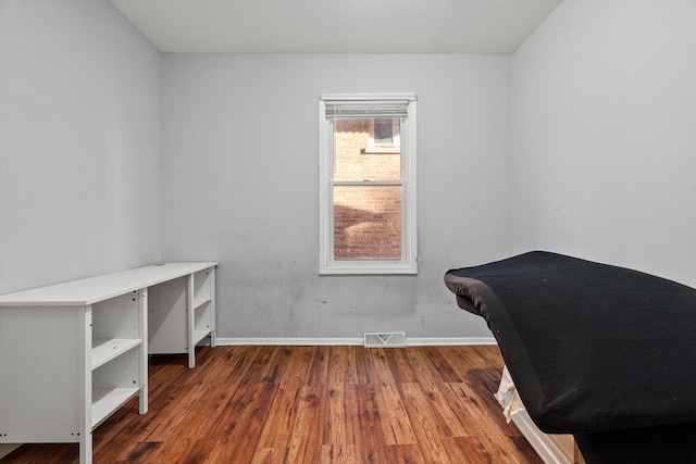 office with wood-type flooring