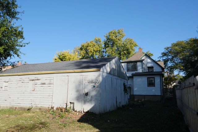 view of home's exterior featuring a shed