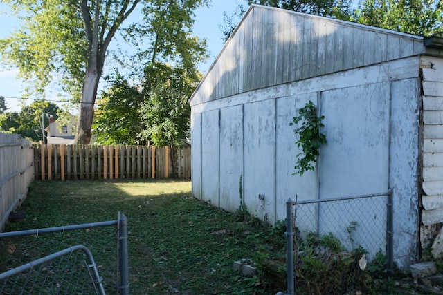 view of outdoor structure with a lawn