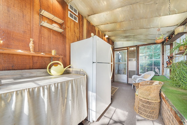 sunroom with lofted ceiling