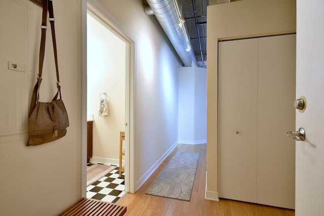 corridor featuring light hardwood / wood-style flooring