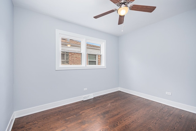 unfurnished room with dark wood-type flooring and ceiling fan