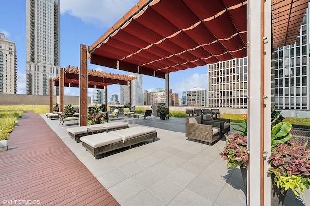 view of patio / terrace featuring an outdoor hangout area and a pergola