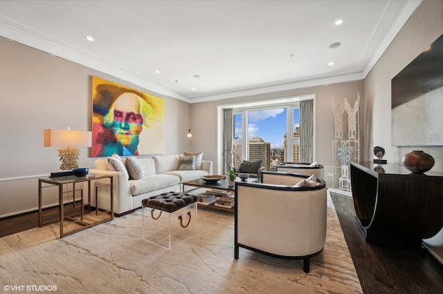 living room with hardwood / wood-style floors and crown molding