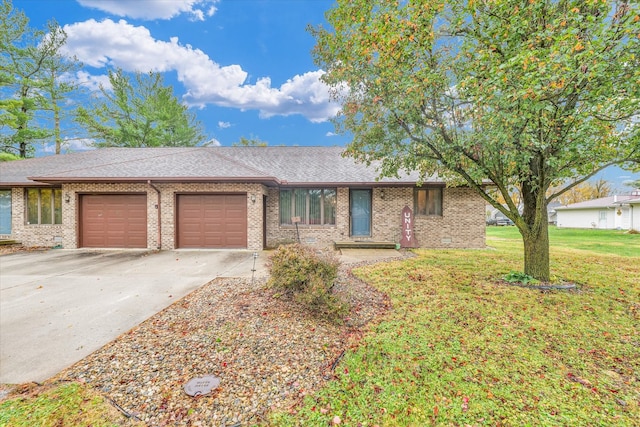 single story home with a garage and a front yard