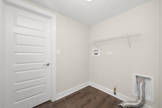 laundry room featuring washer hookup, dark wood-type flooring, and hookup for a gas dryer