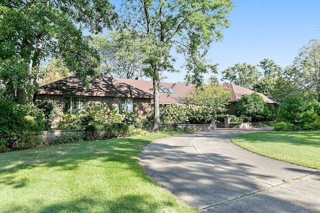 view of front of home with a front lawn