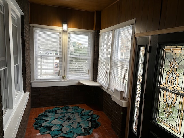 sunroom featuring a healthy amount of sunlight