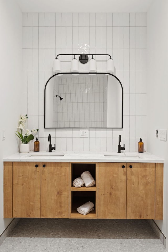 bathroom with vanity and backsplash