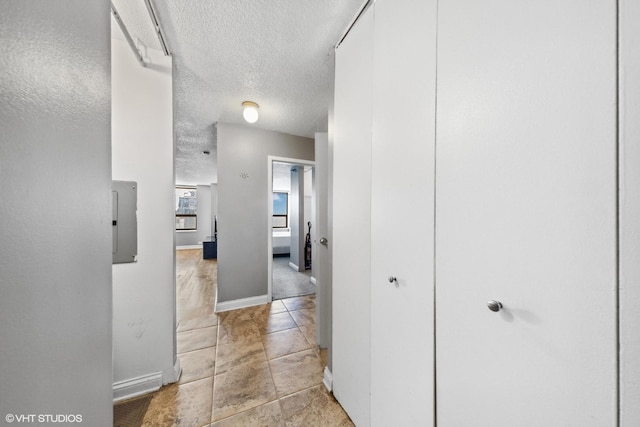 474 N Lake Shore Dr Unit 3303, Chicago, IL 60611 - hall featuring a textured ceiling and baseboards