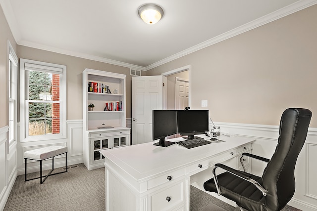 home office with light carpet and crown molding