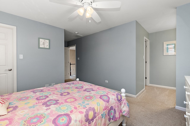 bedroom featuring light carpet and ceiling fan