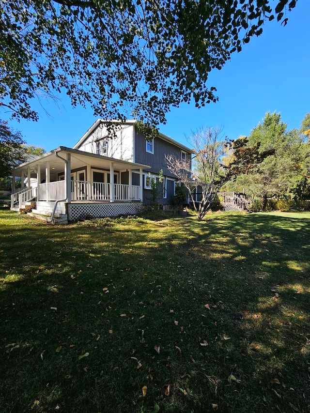 exterior space with a lawn and covered porch