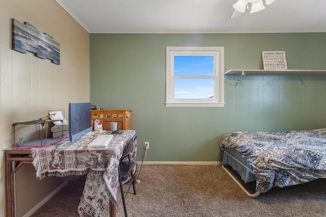 bedroom with ceiling fan, carpet floors, and ornamental molding