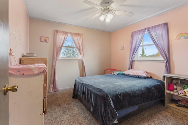 bedroom with ceiling fan and light colored carpet