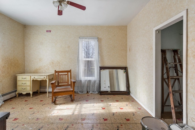 living area with ceiling fan