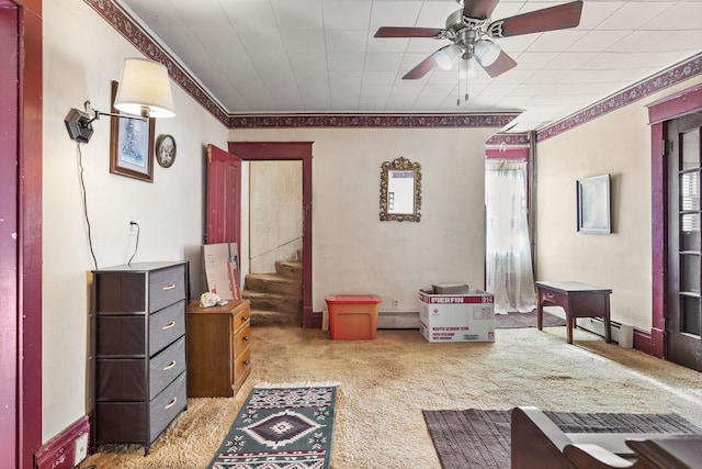 interior space featuring carpet, a wealth of natural light, and ceiling fan