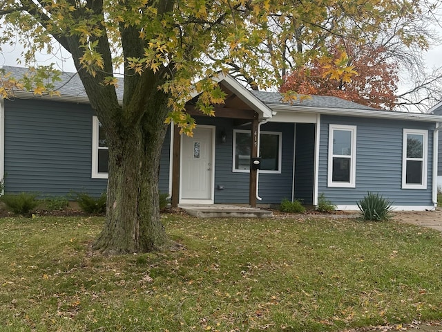 view of front facade with a porch and a front yard