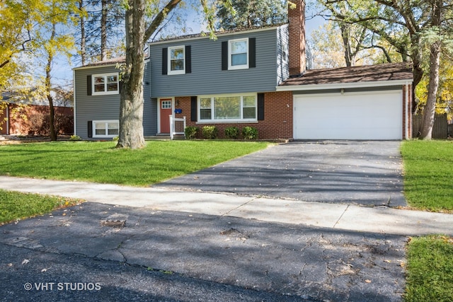 view of front facade featuring a front lawn and a garage