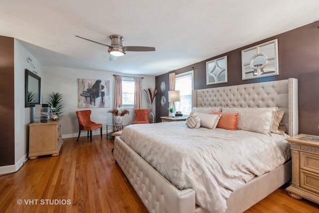 bedroom featuring light hardwood / wood-style floors and ceiling fan