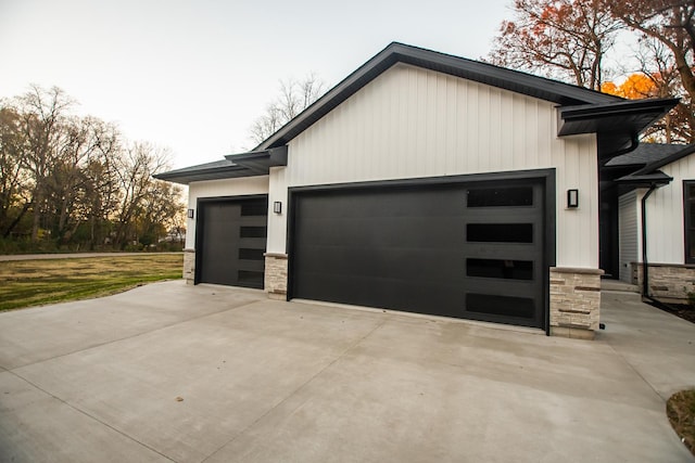garage with concrete driveway