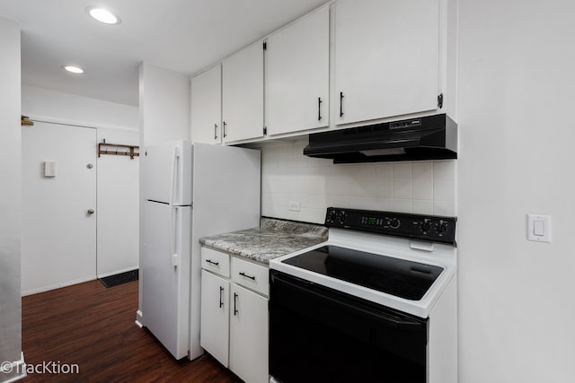 kitchen with white cabinets, white appliances, dark hardwood / wood-style floors, and tasteful backsplash