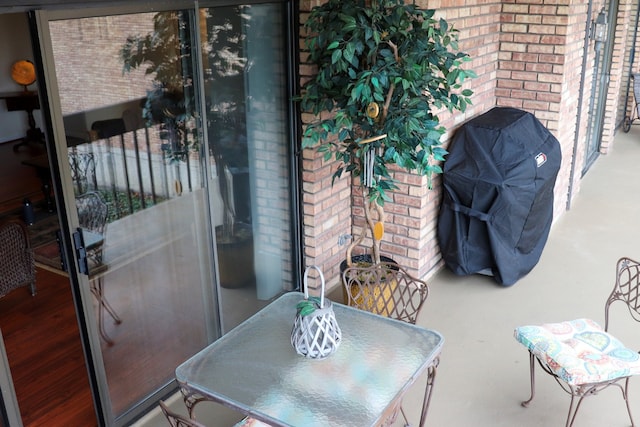 view of patio featuring a grill