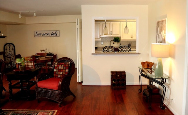 dining space with dark wood-type flooring