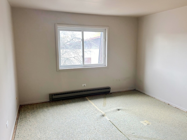 empty room with a baseboard radiator