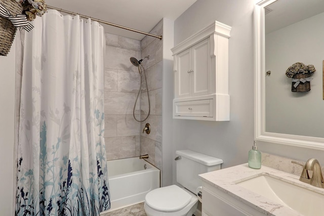 full bathroom with vanity, toilet, and shower / tub combo